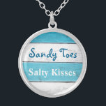 Turquoise Sandy Toes Salty Kisses Necklace<br><div class="desc">This fun and tropical silver plated necklace is accented with the cute saying "Sandy Toes Salty Kisses" on a turquoise and white striped background,  making it a sweet gift for the bride,  bridesmaids or flower girl.</div>