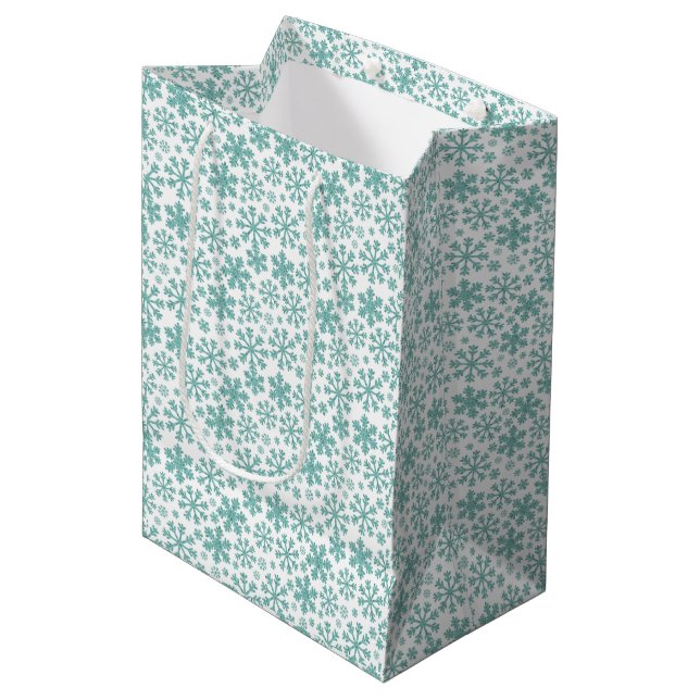 Turquoise snowflakes on white medium gift bag (Front Angled)