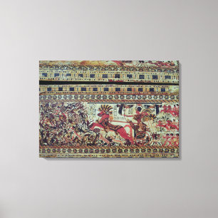 Tutankhamun  on his chariot attacking Africans Canvas Print