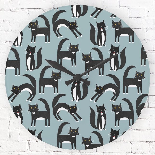 Tuxedo Black and White Cats Round Clock (Black and white tuxedo cats on a duck egg blue background.  Fun wall clock for animal lovers.)