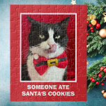 Tuxedo Cat Red Christmas Puzzle<br><div class="desc">This cute tuxedo cat Christmas puzzle features a photograph of a tuxedo cat with her tongue out wearing a Christmas bow.  Below the photograph are the words,  "Someone ate Santa's Cookies."  This is a great puzzle for the cat lover.  Copyright peachesthetuxedocat</div>