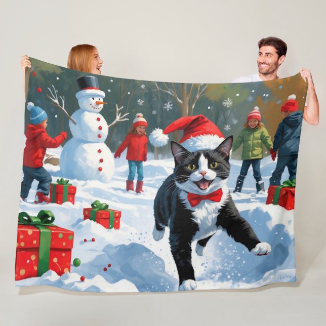 Tuxedo Cat Running in Snow with Christmas Hat Fleece Blanket (In Situ)