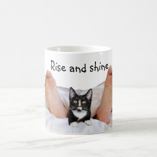 Tuxedo kitty with owner coffee mug