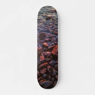 Twilight Treasures: Rocky Beachscape Skateboard