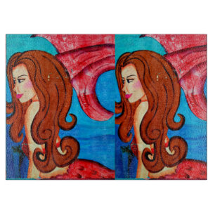 twin redheaded mermaids cutting board