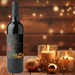 Twinkling Gold Lights Modern Merry Christmas Wine Label<br><div class="desc">This gorgeous Merry Christmas wine label features modern gold handwritten script over twinkling lights next to a festive Christmas tree that is decorated with red and green ornaments. Customise these elegant holiday gift labels for your friends and family with personalised script over the black night sky.</div>