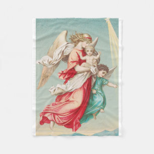 Two angels wear a small child fleece blanket
