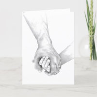 Two arms clasped together in comforting support