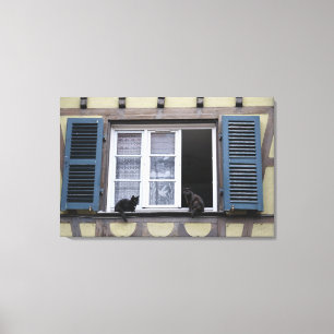 Two Black Cats at Window Canvas Print