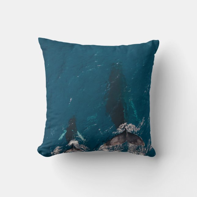 TWO BLACK WHALES SWIMMING IN BODY OF WATER CUSHION (Front)