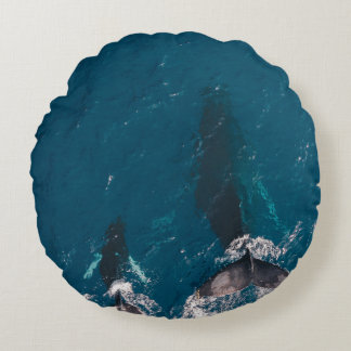 TWO BLACK WHALES SWIMMING IN BODY OF WATER ROUND CUSHION
