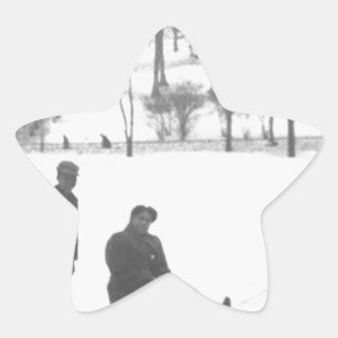 Two Boys Pulling Two Girls on Sleds Star Sticker