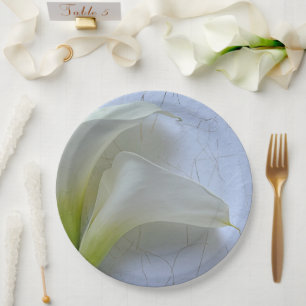 Two calla lilies on textured paper plate