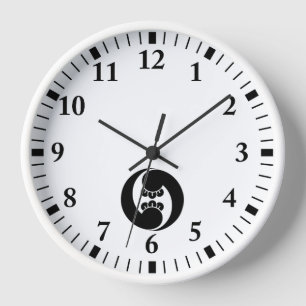 Two counterclockwise clove swirls wall clock