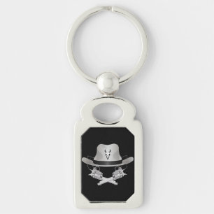 Two crossed guns and hat key ring