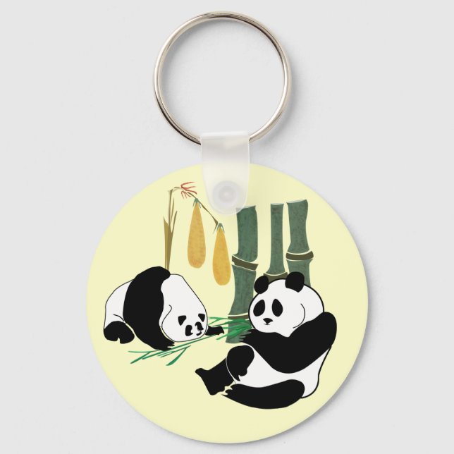Two Cute Pandas eat bamboo in tropical forest Key Ring (Front)
