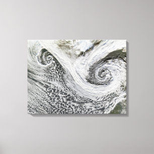 Two cyclones formed in tandem south of Iceland Canvas Print