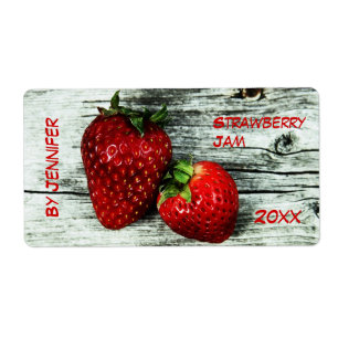 Two deliscious strawberries jam label