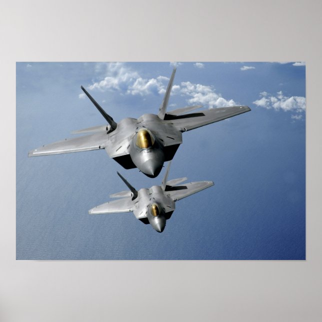 Two F-22 Raptors fly over the Pacific Ocean 2 Poster (Front)