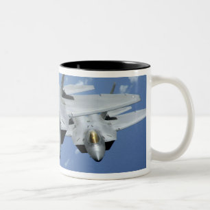 Two F-22 Raptors fly over the Pacific Ocean 2 Two-Tone Coffee Mug