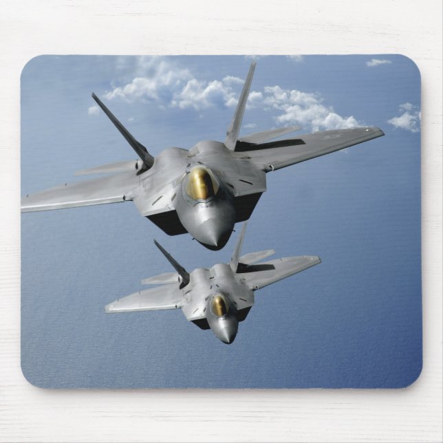 Two F-22 Raptors fly over the Pacific Ocean Mouse Pad (Front)