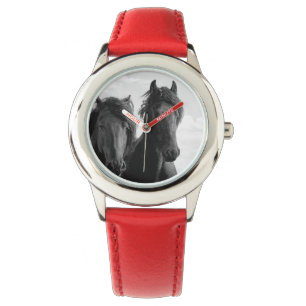 Two Friesian stallions. Watch