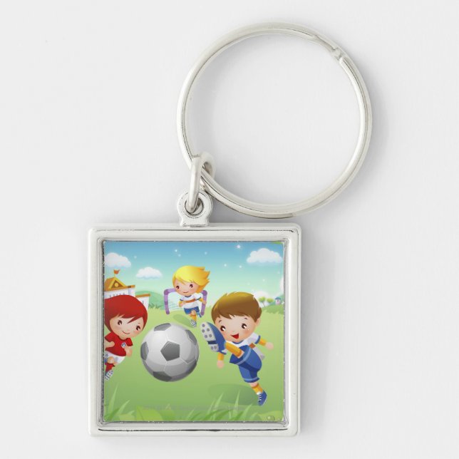 Two girls and a boy playing soccer key ring (Front)