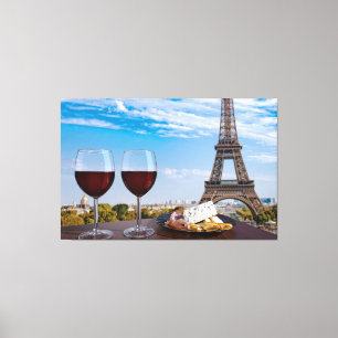 Two glasses of wine in cafe in Paris Canvas Print