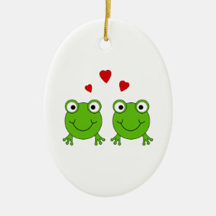 Two green frogs with red hearts. ceramic tree decoration