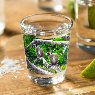 Two Green Monkeys Sitting In Tree Shot Glass