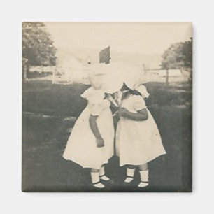 two little girls kissing magnet