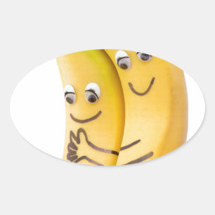 Two loving bananas with eyes and mouth oval sticker