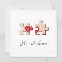 two matching puzzle pieces with a red heart Card