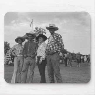 Two men and two women at a rodeo mouse pad