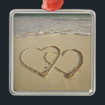 Two overlying hearts drawn on the beach metal tree decoration<br><div class="desc">Beach and Love,  AssetID: 127999579 / {Gen Nishino} / Two overlying hearts drawn on the beach</div>