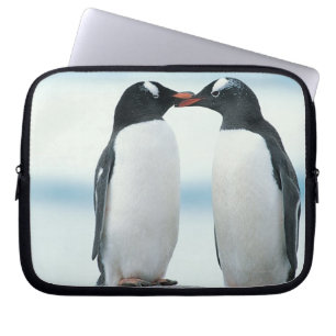 Two Penguins touching beaks Laptop Sleeve