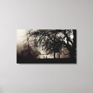 Two people meet in a misty wood canvas print