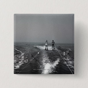Two people waterskiing 15 cm square badge