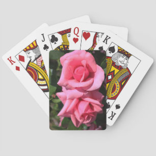 two perfect hot pink rose flowers. love playing cards