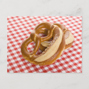 Two pretzel on chequered tablecloth postcard