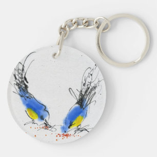 Two small titmouses pecking grain. Calligraphy Key Ring