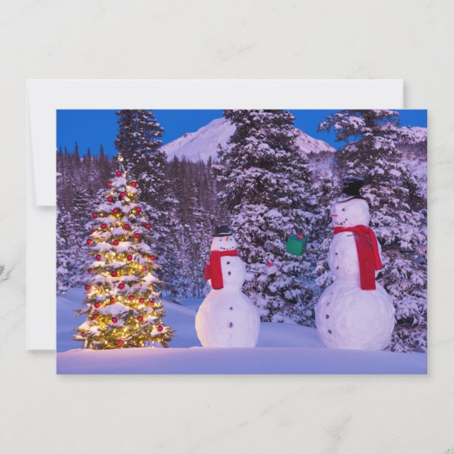 Two Snowmen Exchange Gifts by the Tree Holiday Card (Front)