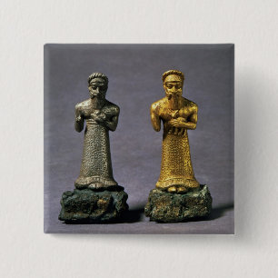 Two statuettes of men carrying offerings of goats, 15 cm square badge