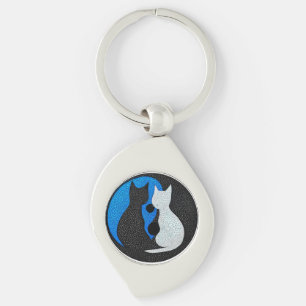 Two stylised cats key ring