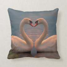 Two swans making a heart with the necks, throw pil