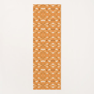 Two views of fabric with a symmetrical orange  yoga mat