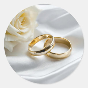 Two wedding rings on satin with white rose classic round sticker