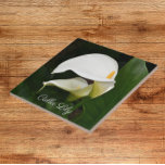 Two White Calla Lilies Floral Tile<br><div class="desc">For flower and plant lovers! Ceramic tile that features a photo image of two,  gorgeous,  white Calla Lilies and their green foliage. A lovely,  floral design! Select your tile size. Makes a pretty kitchen trivet!</div>