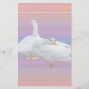 two white geese in fancy background stationery