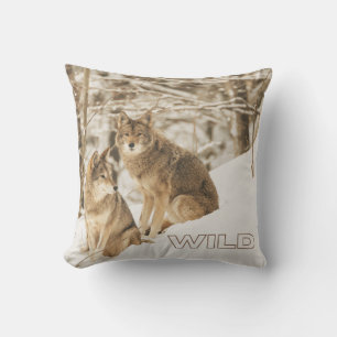 Two Wild Wolves Resting Against a Snowy Backdrop Cushion